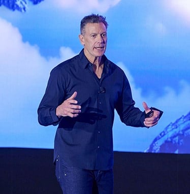 Mark Pattison corporate keynote speaker presenting to business audience